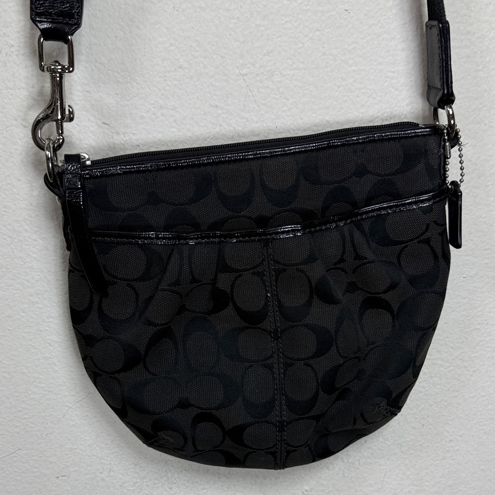 (X4) Coach crossbody bag with black and silver hardware,canvas and leather logo